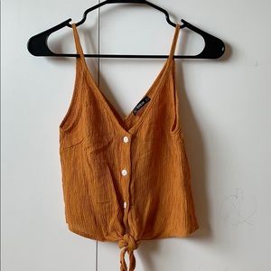 Burnt yellow/orange tie front tank top